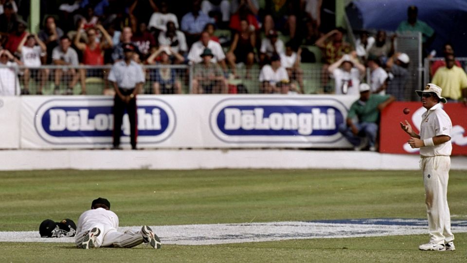 In and out - Ian Healy puts down Brian Lara during the climactic stages of the 1999 Barbados Test