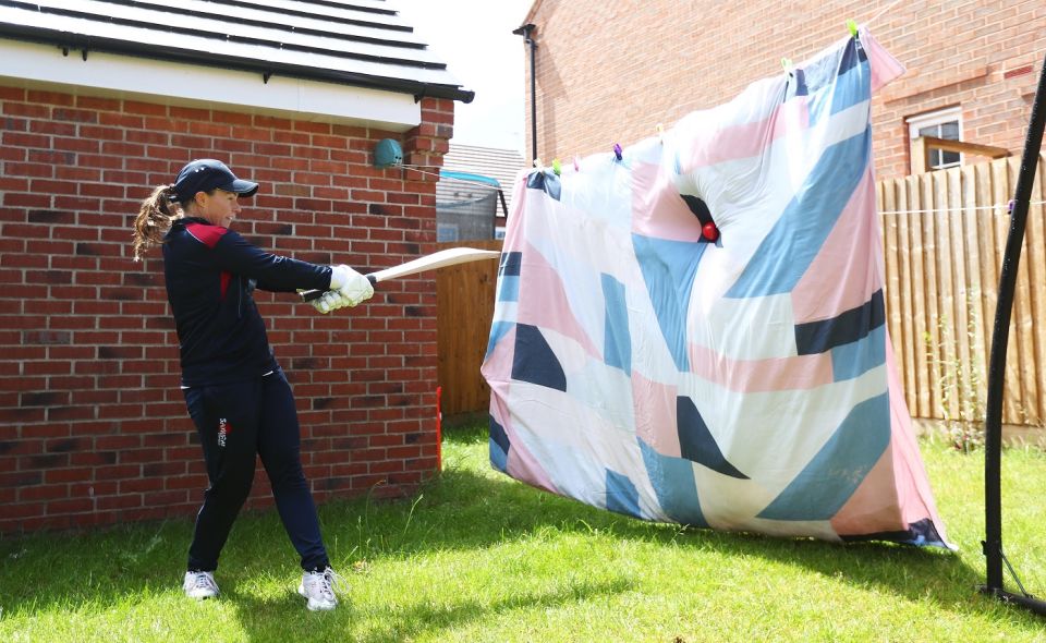 England batter Tammy Beaumont makes do with a makeshift net in her garden