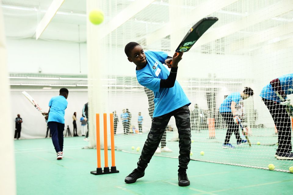 Kids get coached at an ACE event at The Oval