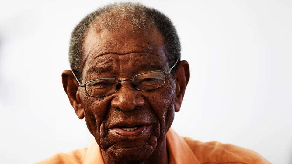 Sir Everton Weekes attends a Test at Kensington Oval