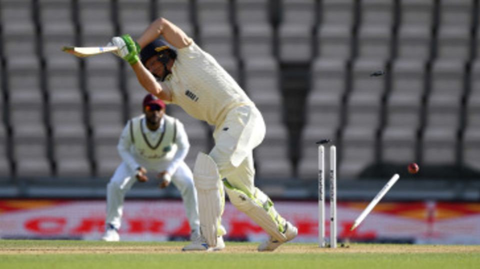 Jos Buttler is bowled by Alzarri Joseph
