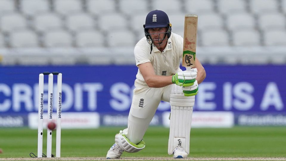Jos Buttler drives into the covers