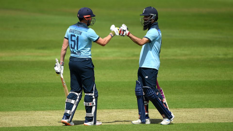 Moeen Ali and Jonny Bairstow punch gloves during England's warm-up
