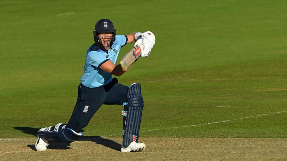 Sam Billings hits a shot to the boundary