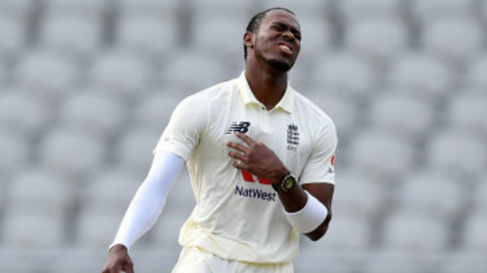 Jofra Archer winces during his spell