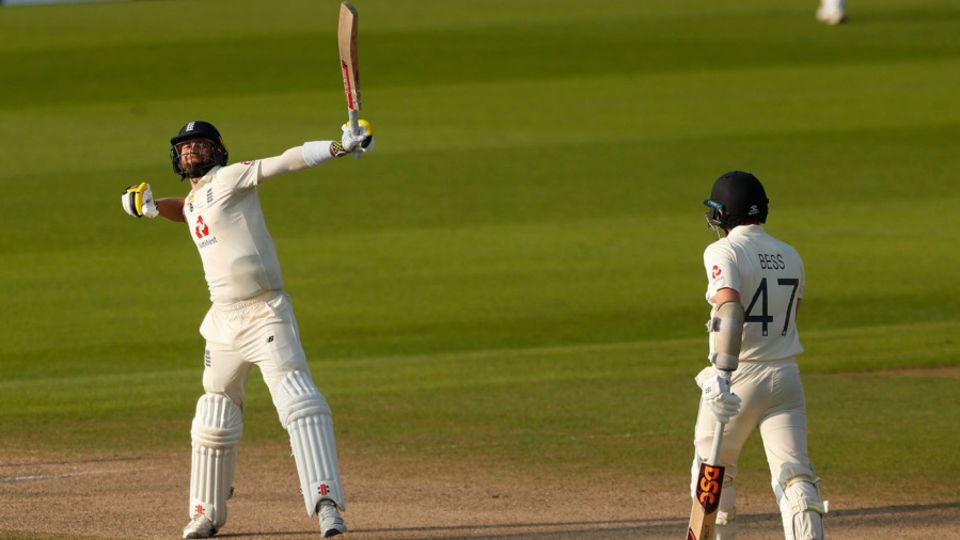 Chris Woakes celebrates the moment of victory