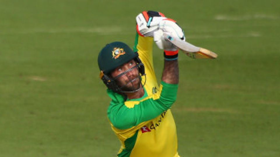 Glenn Maxwell lofts the ball away during his century