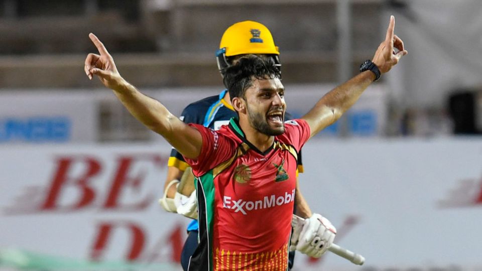 Naveen-ul-Haq celebrates a wicket for Guyana Amazon Warriors in the CPL