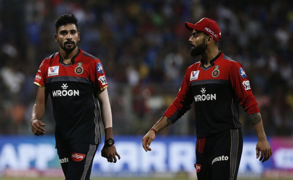 Although he helps check the runs with his fielding in the deep, Virat Kohli possibly needs to spend more time talking to his bowlers during the death overs