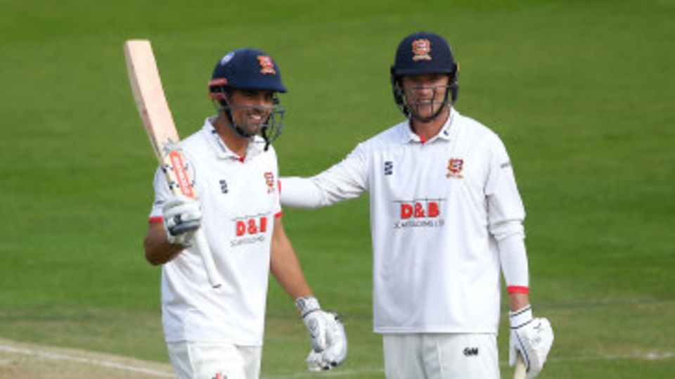 Alastair Cook is congratulated by Tom Westley on his century
