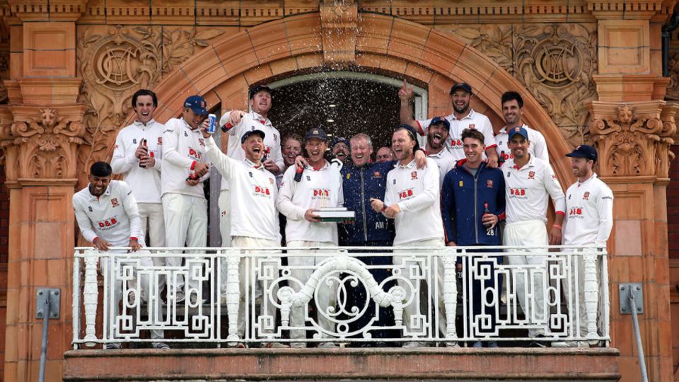 Essex's players celebrate on the team balcony