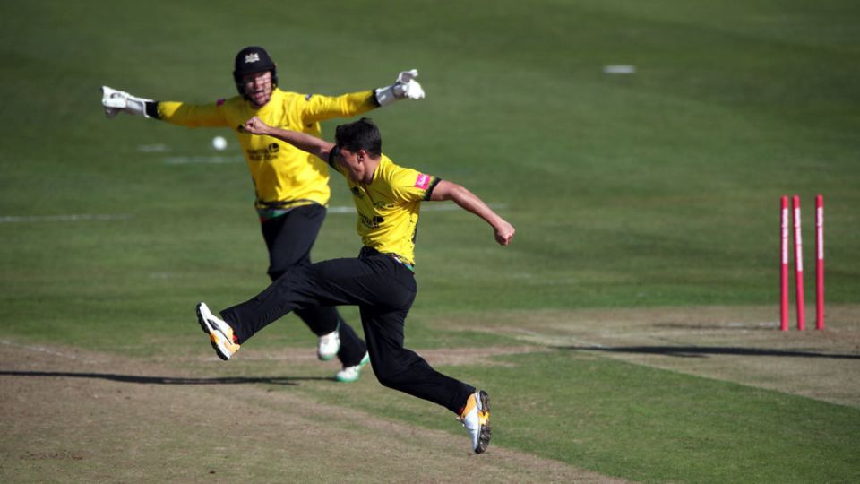 Benny Howell leaps in triumph after another wicket for Gloucestershire