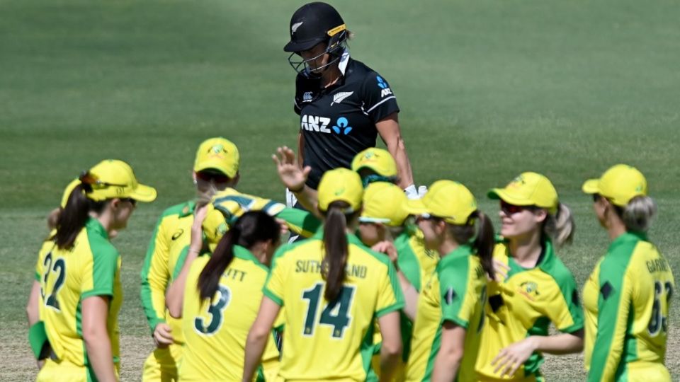 Sophie Devine walks back after her dismissal