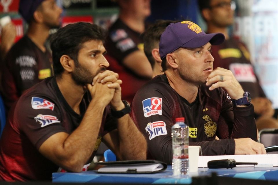 KKR's Brendon McCullum and Abhishek Nayar look on