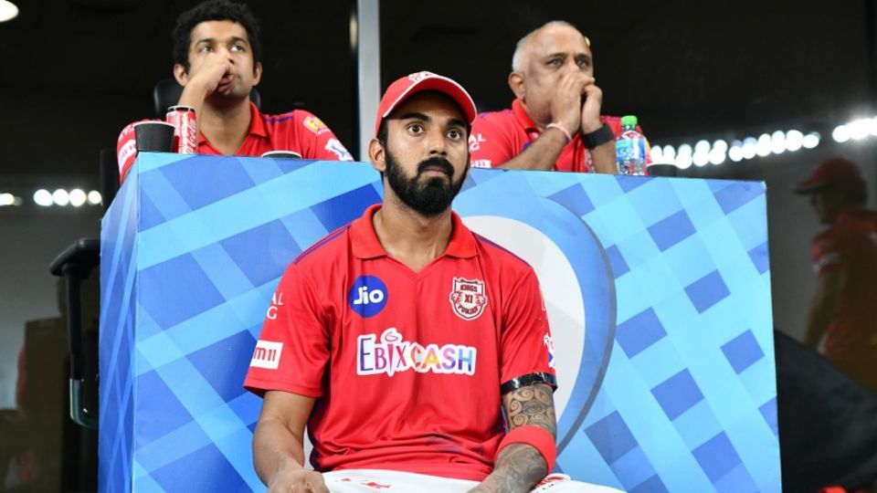 A tense KL Rahul looks on from the dressing room