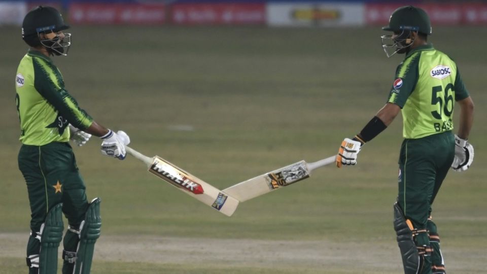 Mohammad Hafeez and Babar Azam tap bats during their partnership