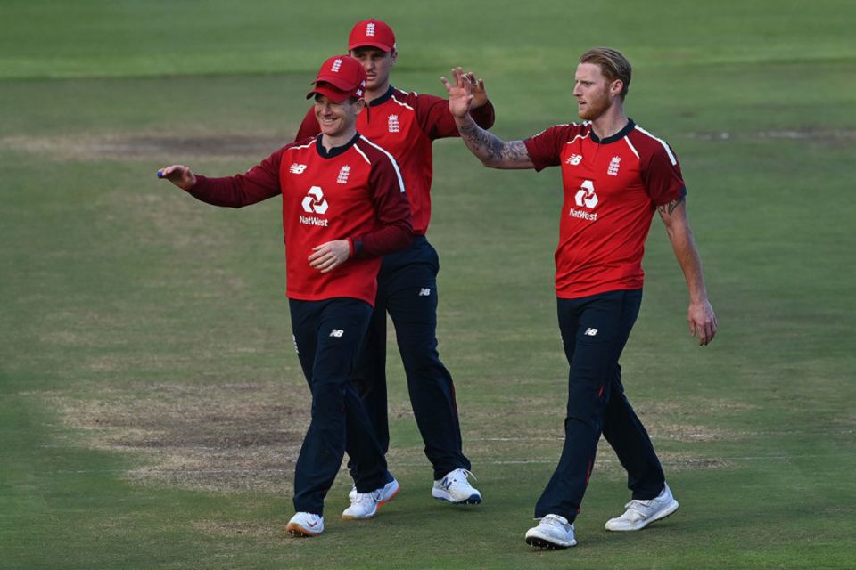 Eoin Morgan, Ben Stokes and Jason Roy celebrate another England wicket
