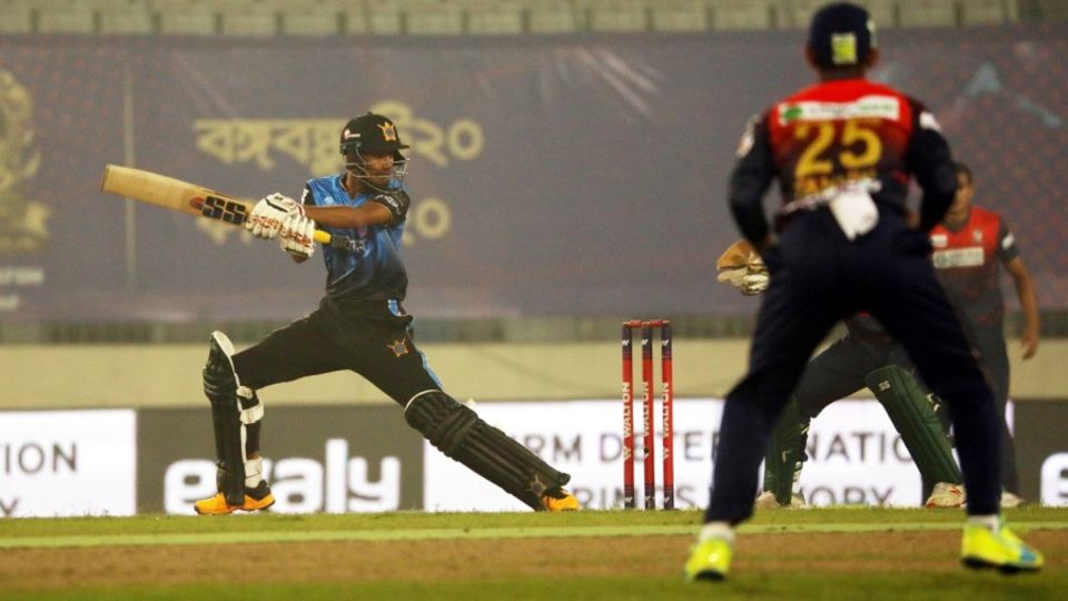 Mohammad Naim cuts en route to his knock of 105 from 64 balls