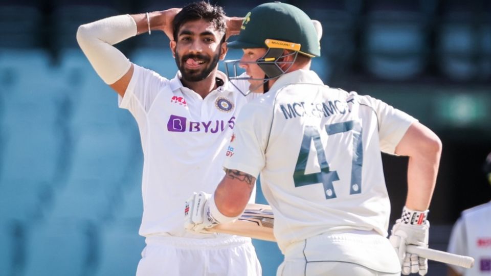 Jasprit Bumrah reacts as Ben McDermott picks him up for runs