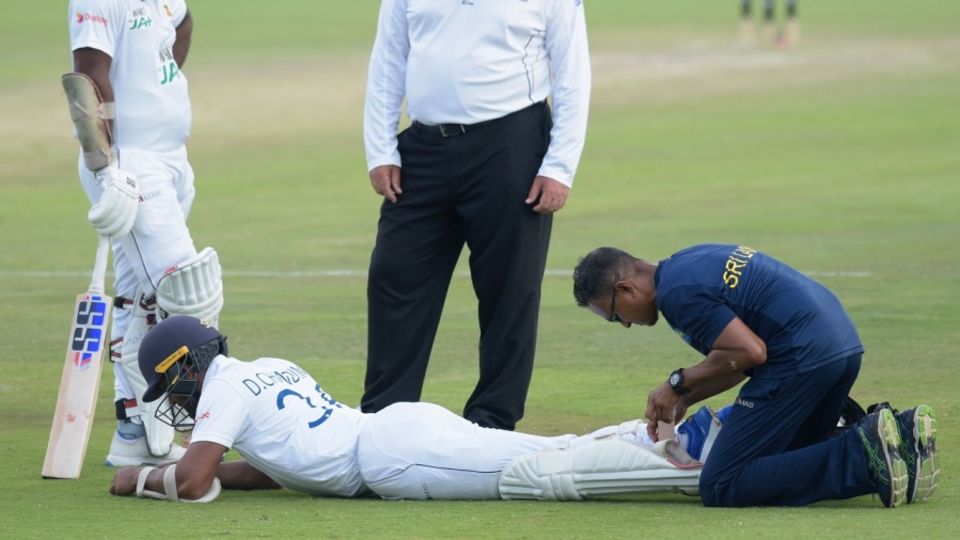 Dinesh Chandimal receives some treatment from the physio