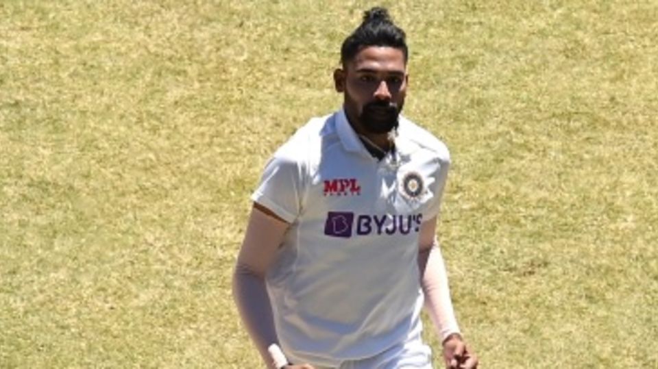 Mohammed Siraj celebrates after dismissing Nathan Lyon