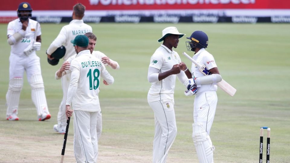 Faf du Plessis grabs a stump as South Africa celebrate their win