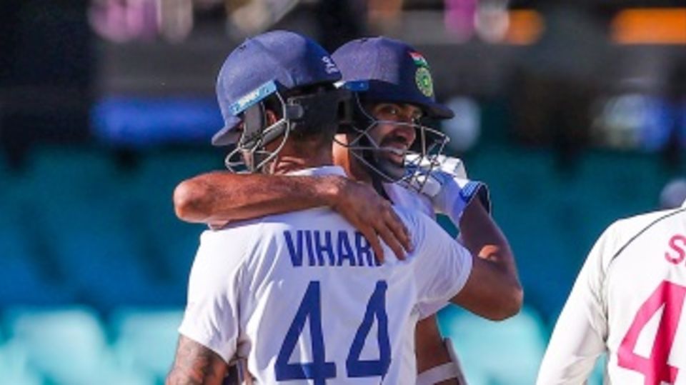 R Ashwin embraces Hanuma Vihari after the match ended in a draw