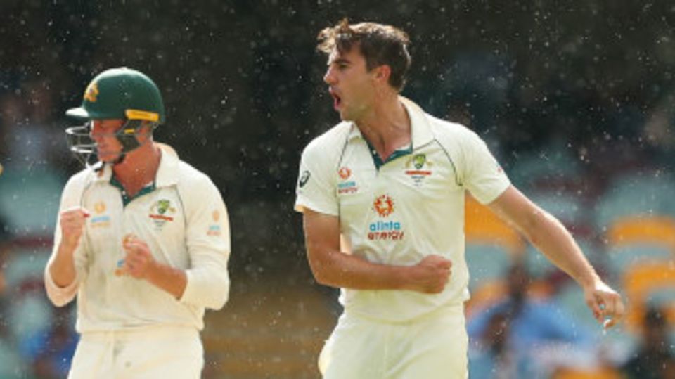 Pat Cummins celebrates Cheteshwar Pujara's wicket