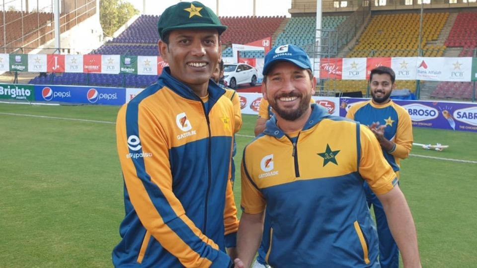 Nauman Ali receives his Test cap from Yasir Shah