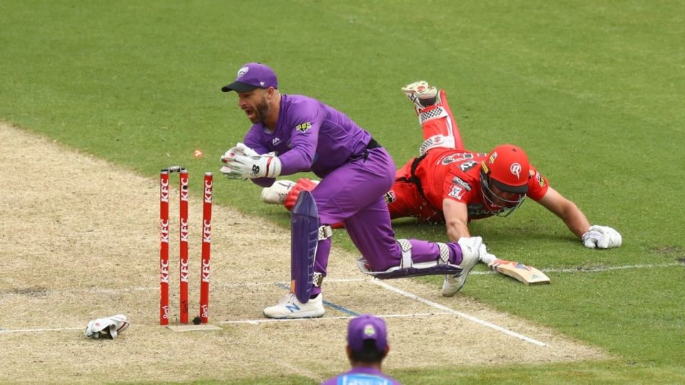 Beau Webster dives to make his ground