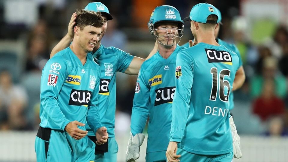 Mitchell Swepson celebrates with team-mates after dismissing Alex Ross