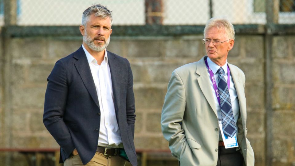 Will Glenwright (left) and former Cricket Scotland chairman Tony Brian watch the final of the 2019 Women's T20 World Cup Qualifier