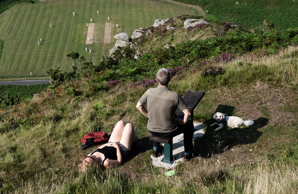 A dog and its humans enjoy a match in North Devon's Valley of Rocks