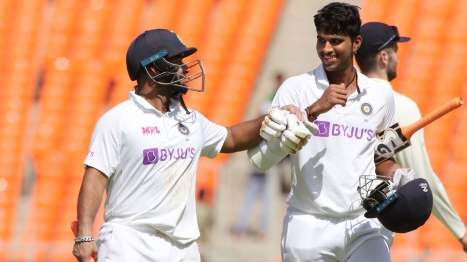 Rishabh Pant and Washington Sundar share a light moment in the middle