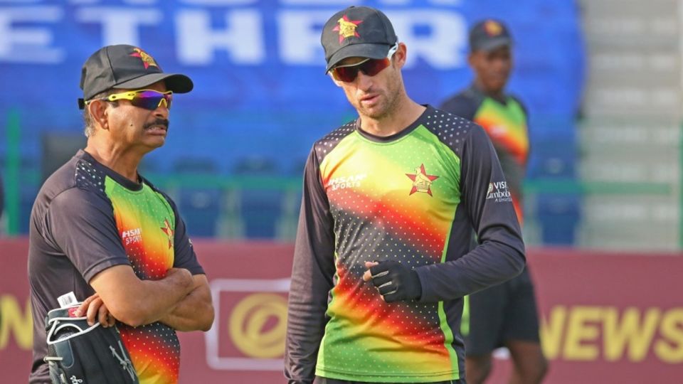 Captain Sean Williams and coach Lalchand Rajput have a chat