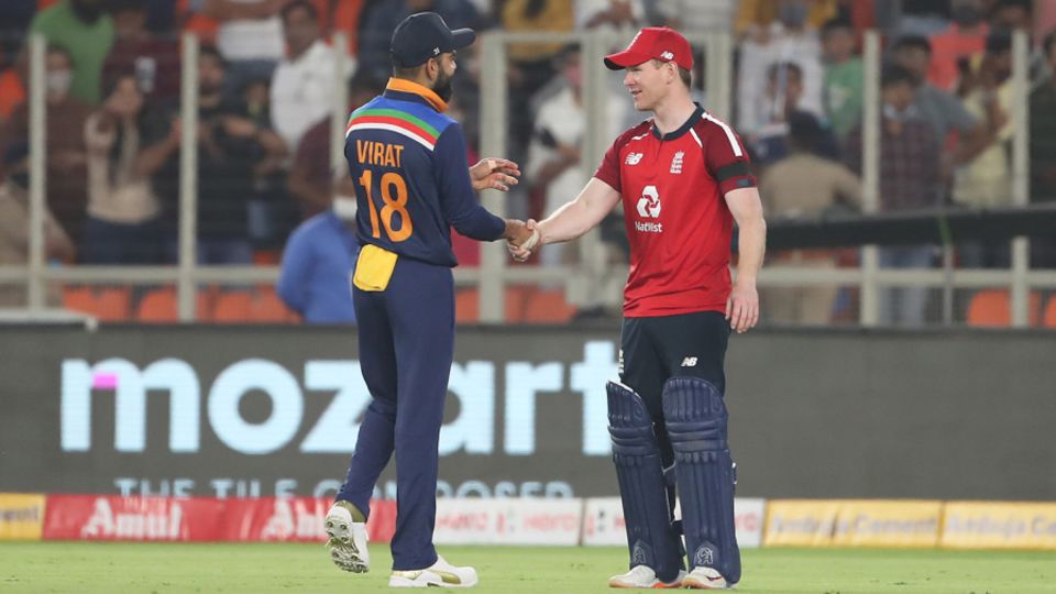 Virat Kohli and Eoin Morgan shake hands after England's win in the first match
