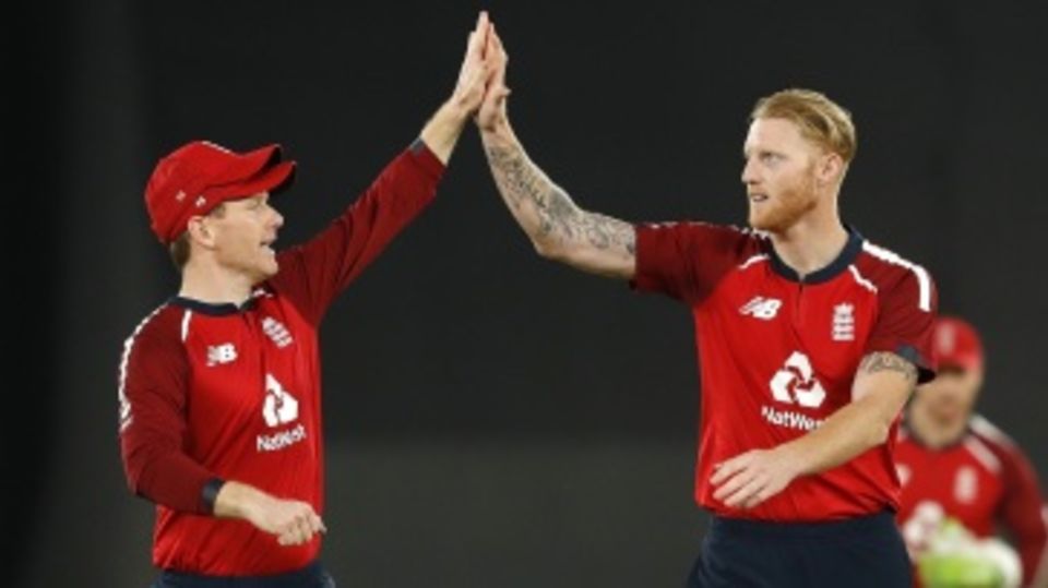 Eoin Morgan and Ben Stokes celebrate KL Rahul's wicket