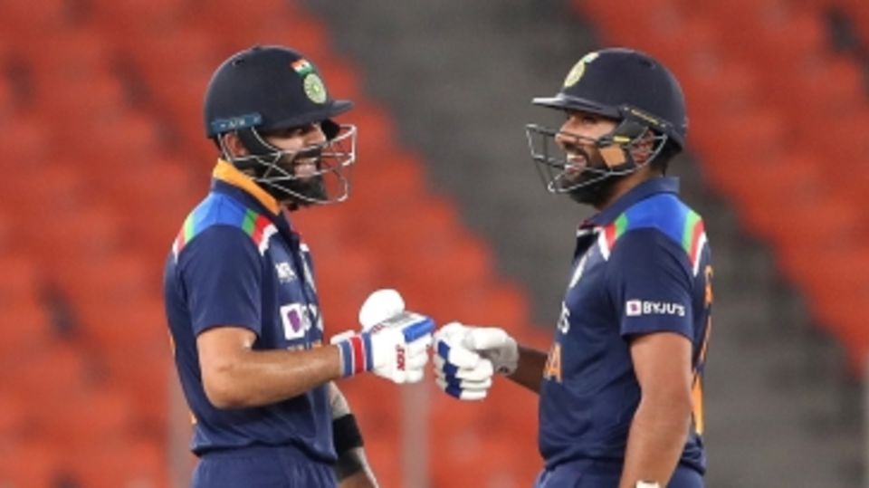 Virat Kohli and Rohit Sharma share a laugh during a blazing opening stand