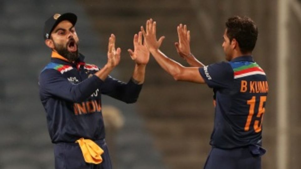 Virat Kohli and Bhuvneshwar Kumar celebrate a wicket