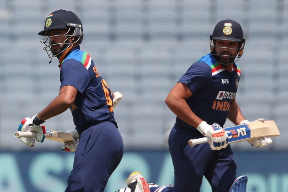 Shikhar Dhawan and Rohit Sharma hare across for a single