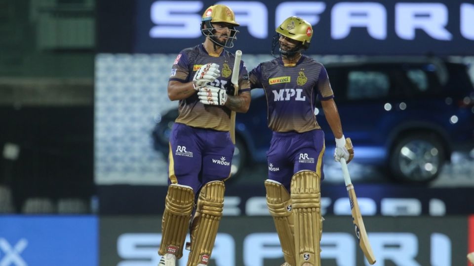 Rahul Tripathi congratulates Nitish Rana after the latter reached his fifty