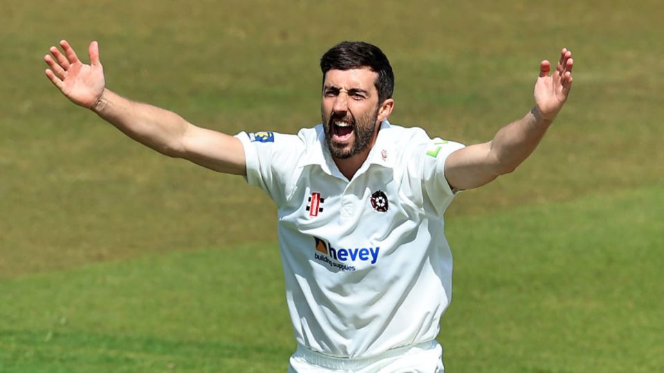 Ben Sanderson celebrates after taking a wicket