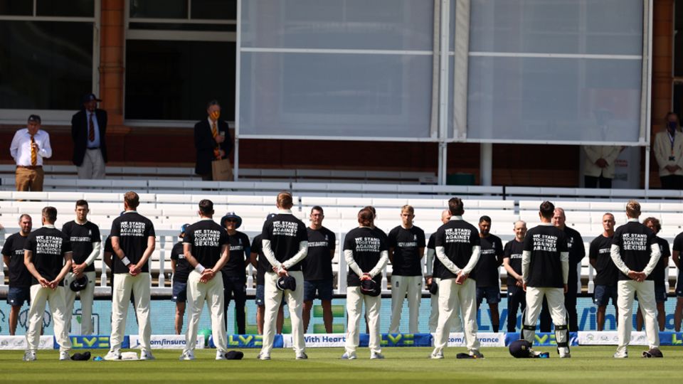 England players and staff stand for a Moment of Unity whilst wearing anti-discrimination T-shirts