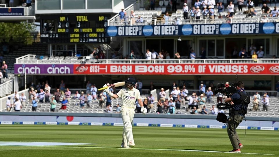 Rory Burns walks off the field after scoring 132