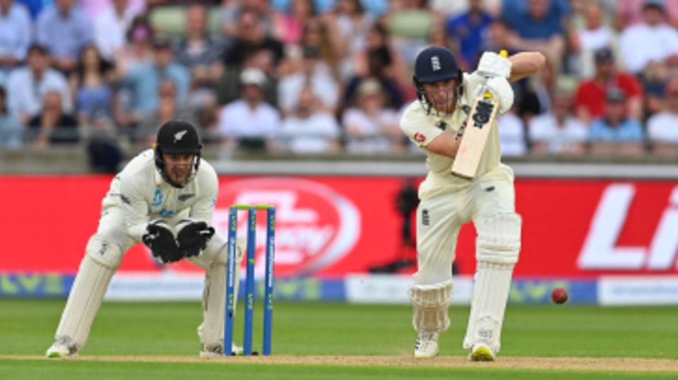 Dan Lawrence drives down the ground