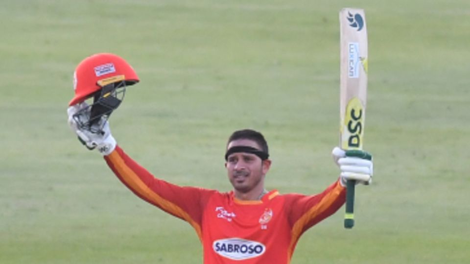 Usman Khawaja celebrates his hundred