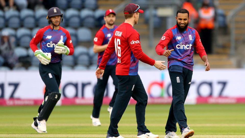 Adil Rashid celebrates after team-mate Chris Jordan's catch to remove Wanindu Hasaranga
