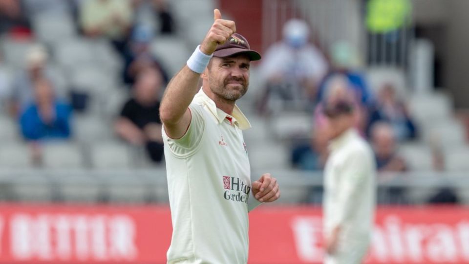 James Anderson gives a thumbs-up after reaching 1000 first-class wickets in a career-best display