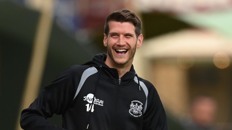 David Payne reacts to his England call-up during Gloucestershire's match against Middlesex