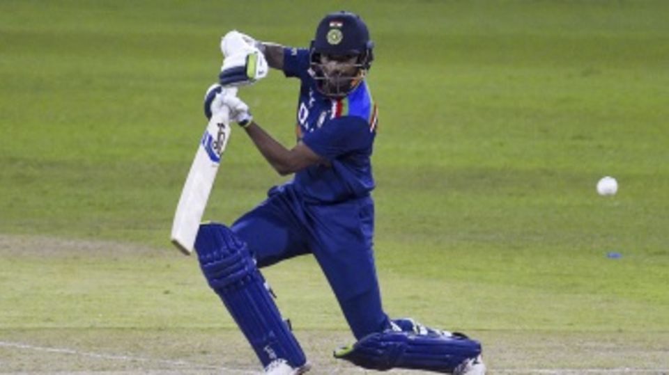 Shikhar Dhawan lunges to play one onto the off side